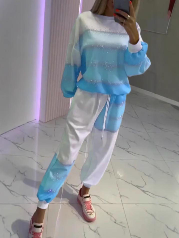 Женский повседневный комплект из топа с брызгами и полосками и брюк на кулиске - Коллекция 2025