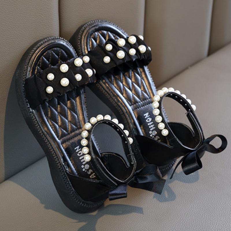 2024 Детские сандалии для девочек, летние детские сандалии с жемчугом, модные повседневные пляжные римские сандалии принцессы, черные, белые, универсальные