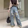 Тай-дай Пустошь Ветер Широкие штанины Рваные джинсы Женские Ретро Большие размеры Осень Драпирующиеся Волочащиеся брюки Ретро Уличный стиль Мешковатые Длинные джинсы для женщин