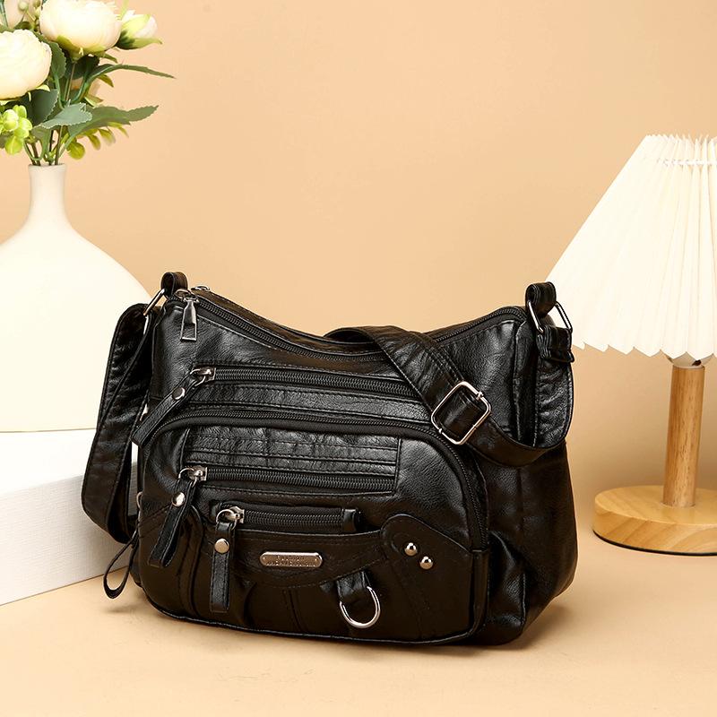 Женская сумка через плечо из мягкой кожи с несколькими отделениями и карманами