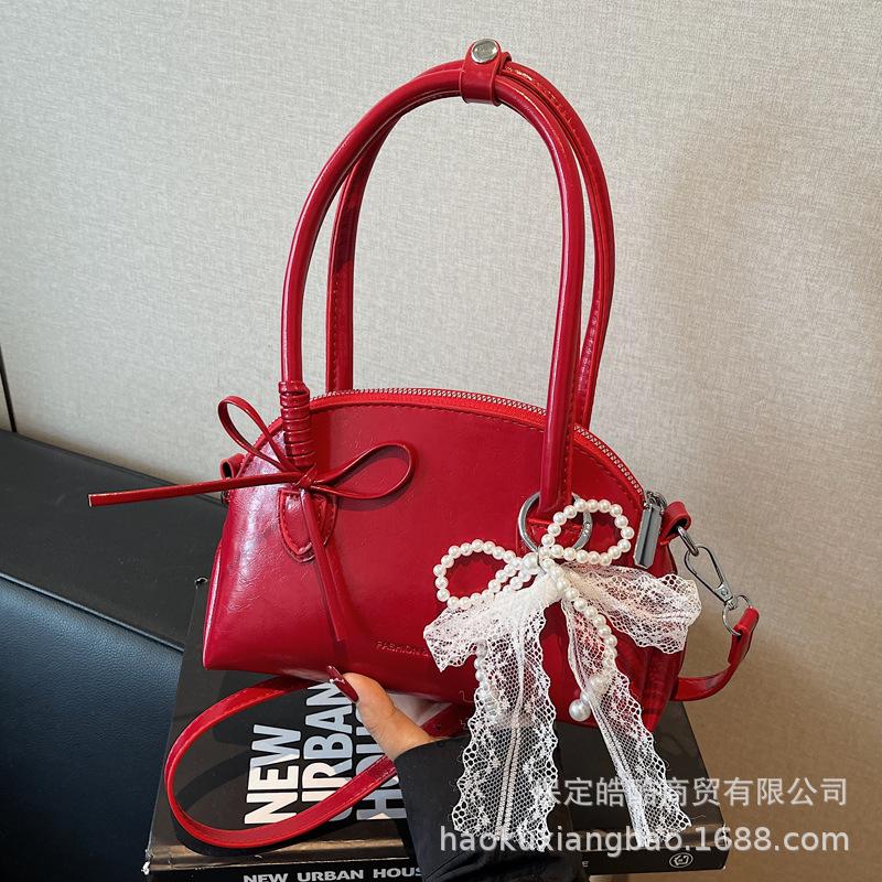 Изысканная супер-горячая нишевая сумка женская 2025 новая летняя модная универсальная на плечо, кроссбоди, сумочка, маленькая сумка