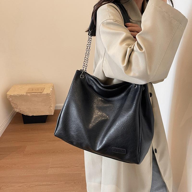 Сумка большой вместимости Женская мода Новая универсальная сумка через плечо для通勤 Тоут