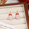 Праздничные серьги «Олень и пряничный человечек»: Рождественский мультяшный дизайн с капельным маслом