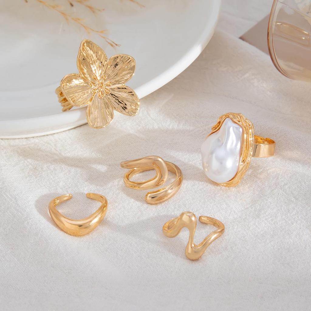 Европейское и американское кольцо с полым неровным дизайном из жемчуга, со стразами и дизайном костяшки в виде цветка