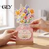 Professional Planner for Desk 2027 Floral Calendar, Vase Shaped English Table Calendar with Wood Base, Gift Boxed Holidays Decorative Desktop