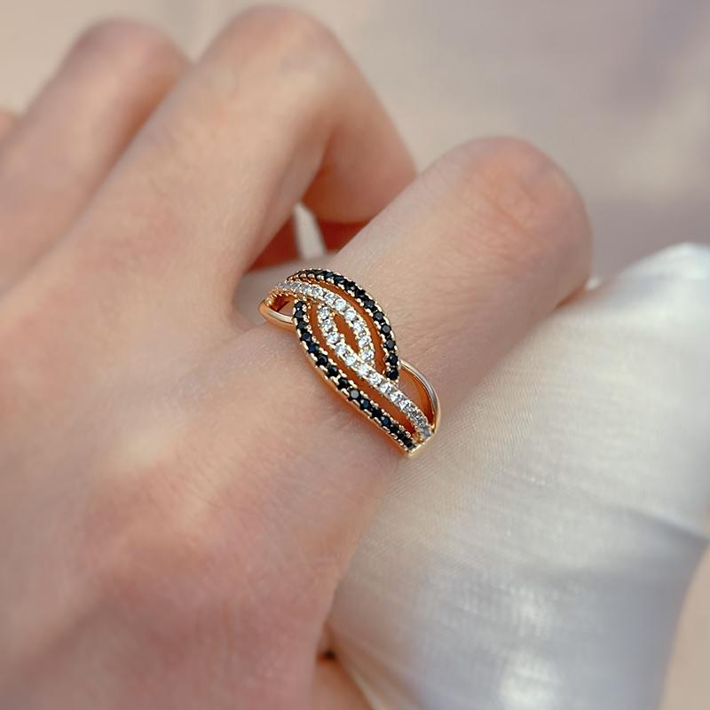 Женские кольца Kinel Twist с черным и белым цирконом в этническом стиле