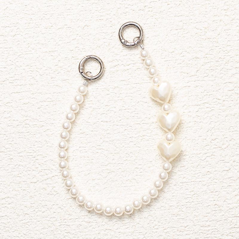 Жемчужный бант на запястье: Стиль Douyin, Защита от потери, Универсальная высококлассная цепочка из бусин для мобильных телефонов