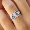 Huitan 2023 New Woman Ring Twist Infinite Shape Crystal Cubic Zirconia Rings Exquisite Female Wedding Bands Fashion Zircon Bulk