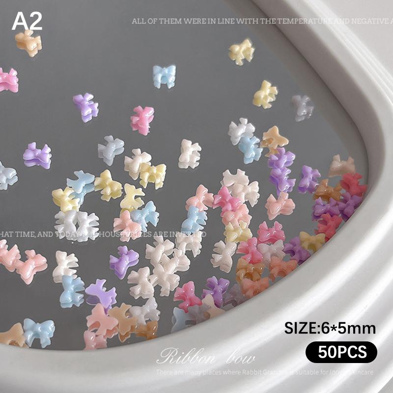 50pcs Nail Art Decor Accessories Candy Color Bow Nail Art Parts Charms Mini Resin Ribbon Nail Rhinestones DIY Summer