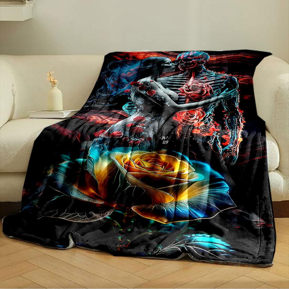 A glowing rose contrasts with a couple blending life and skeletal forms. for all seasons blanket lunch break throw gift