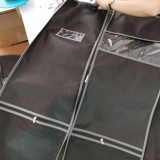 Пылезащитный чехол для одежды из нетканого материала. Дорожная сверхпрочная сумка для одежды с карманами. Прозрачное окно. Водонепроницаемая этикетка. Складная пыленепроницаемая сумка для костюма.