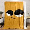 Minimalist cartoon face with large expressive eyes and a sly smile. for all seasons blanket lunch break throw gift