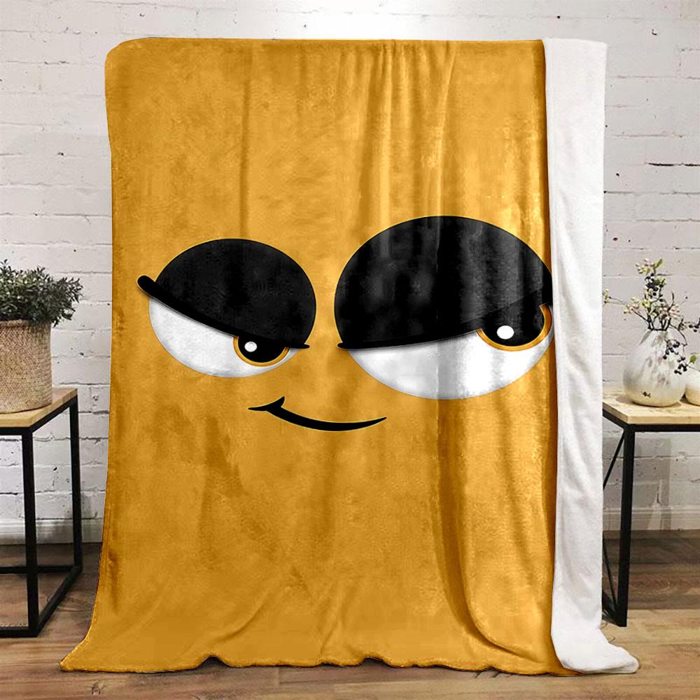 Minimalist cartoon face with large expressive eyes and a sly smile. for all seasons blanket lunch break throw gift
