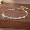 ORSA JEWELS Браслет-цепочка Танцующий бриллиант из стерлингового серебра 925 пробы с покрытием 14К золотом с кубическим цирконием изумрудной огранки и звеньями типа "скрепка" SB214