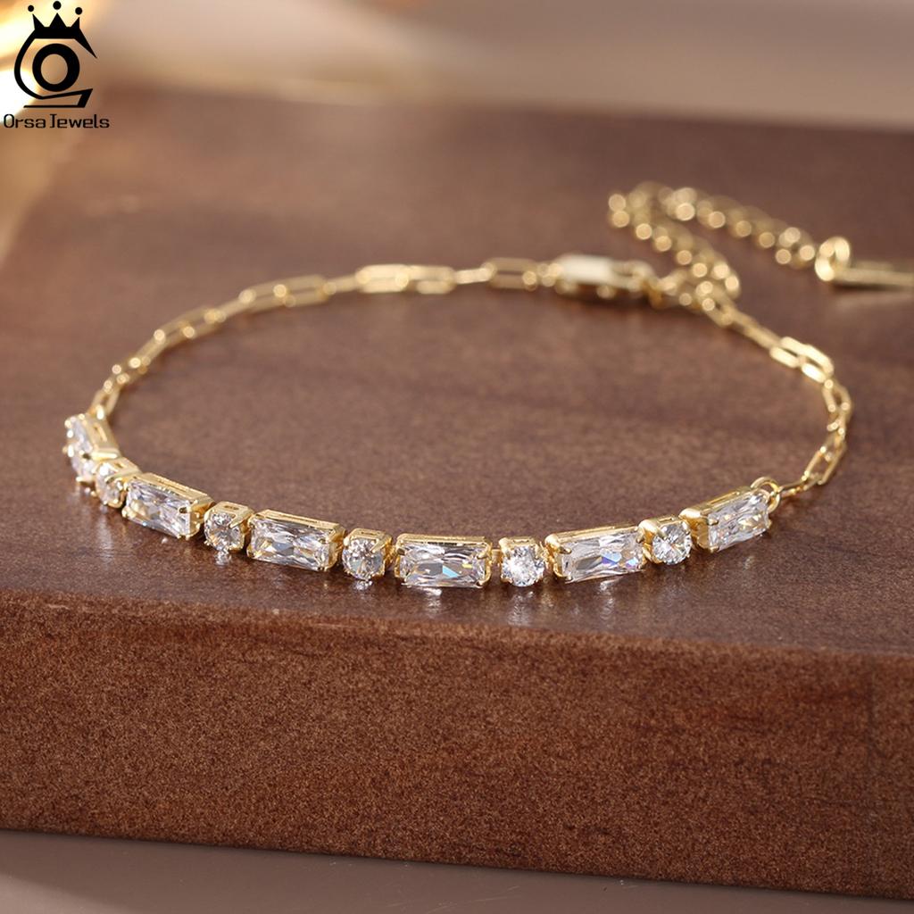 ORSA JEWELS Браслет-цепочка Танцующий бриллиант из стерлингового серебра 925 пробы с покрытием 14К золотом с кубическим цирконием изумрудной огранки и звеньями типа "скрепка" SB214