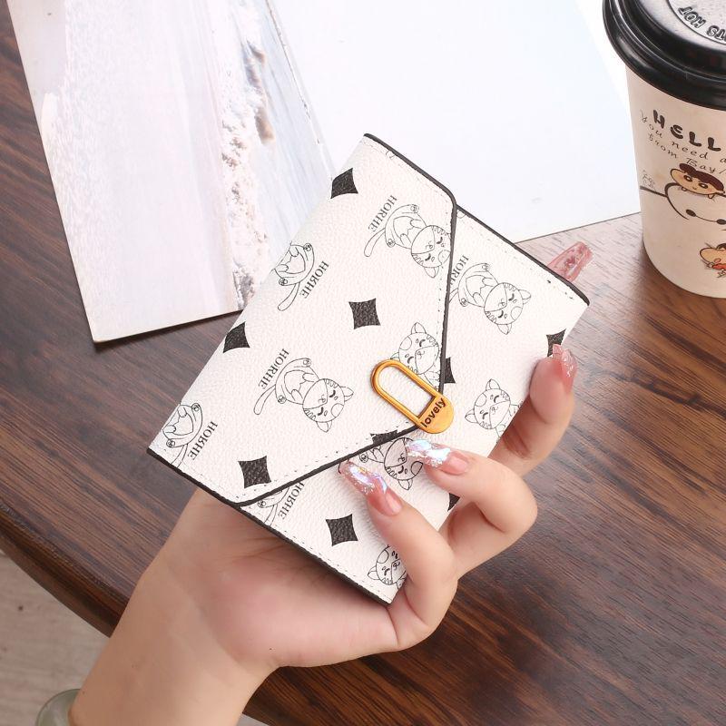 2024 Модный женский кошелек тройного сложения: Компактный дизайн с несколькими отделениями для карт и кошельком для монет