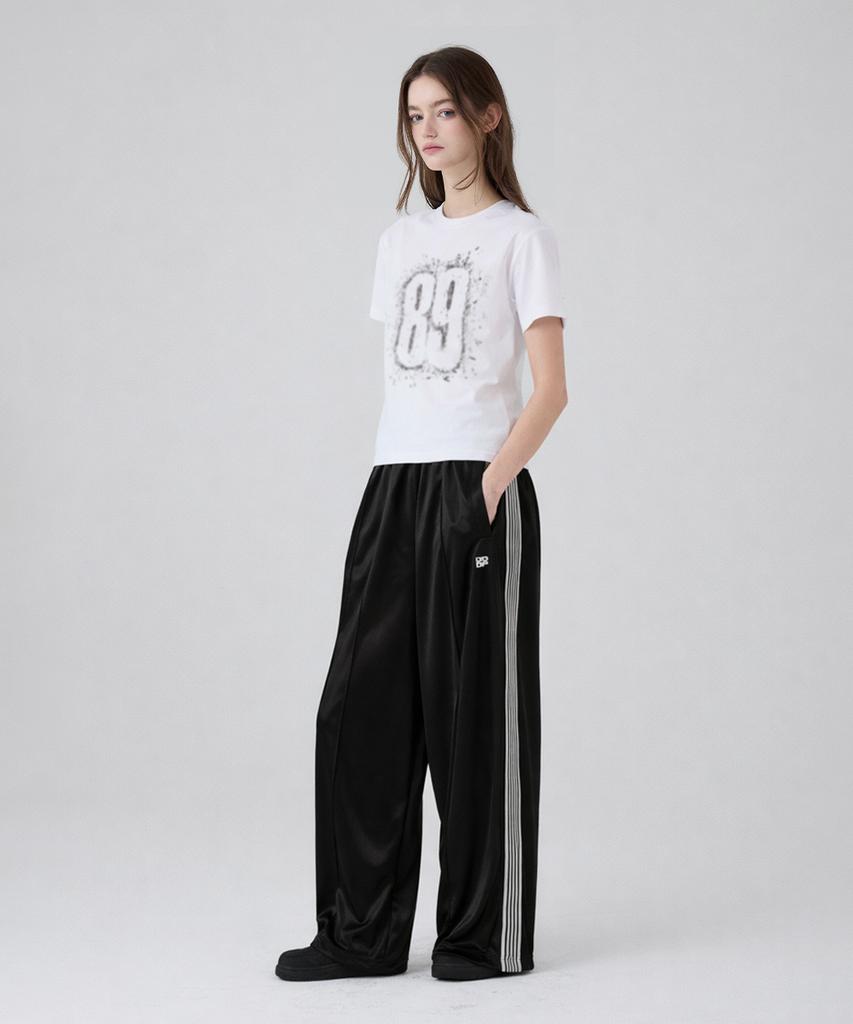 DANGLEDROP Dgdp Balloon Fit Curved Line Track Pants_Black