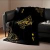 Golden ornate spade symbol with intricate swirls on a black background. for all seasons blanket lunch break throw gift