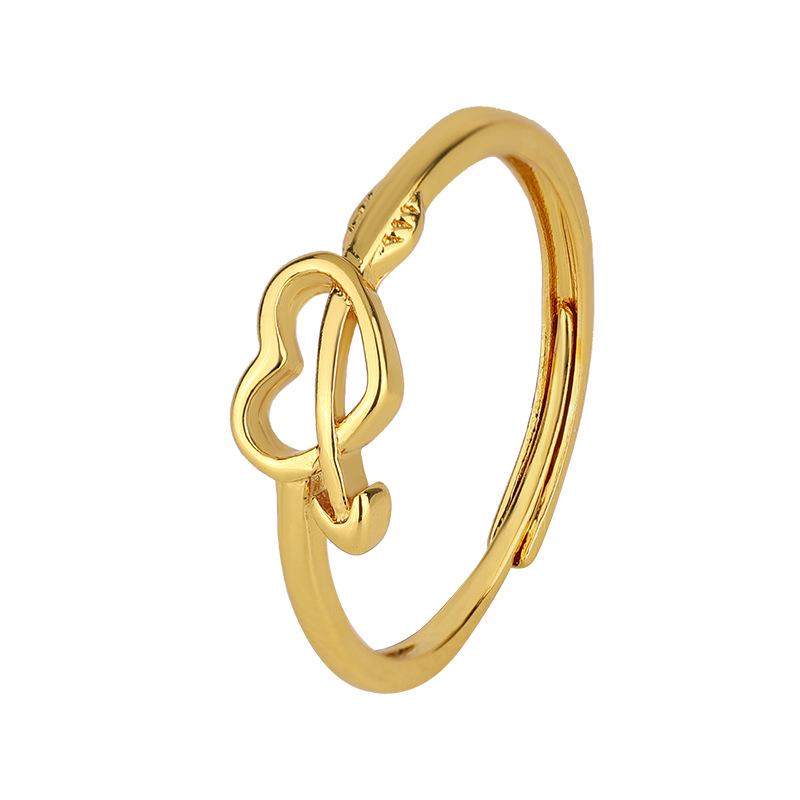 Exquisite New Year Style Hollow Heart Ring: Trendy Woman's Design with Arrow Through the Heart.