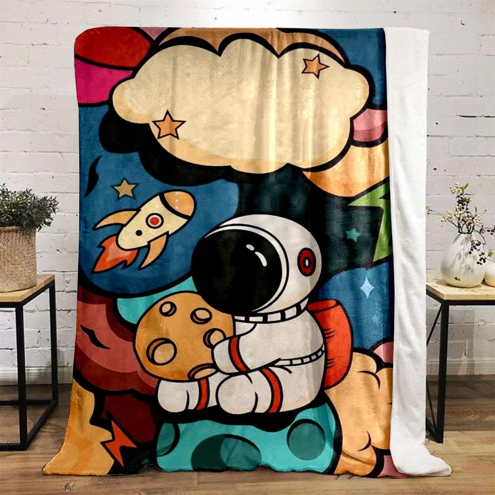 Astronaut on colorful planets with rocket, stars, and playful design. for all seasons blanket lunch break throw gift