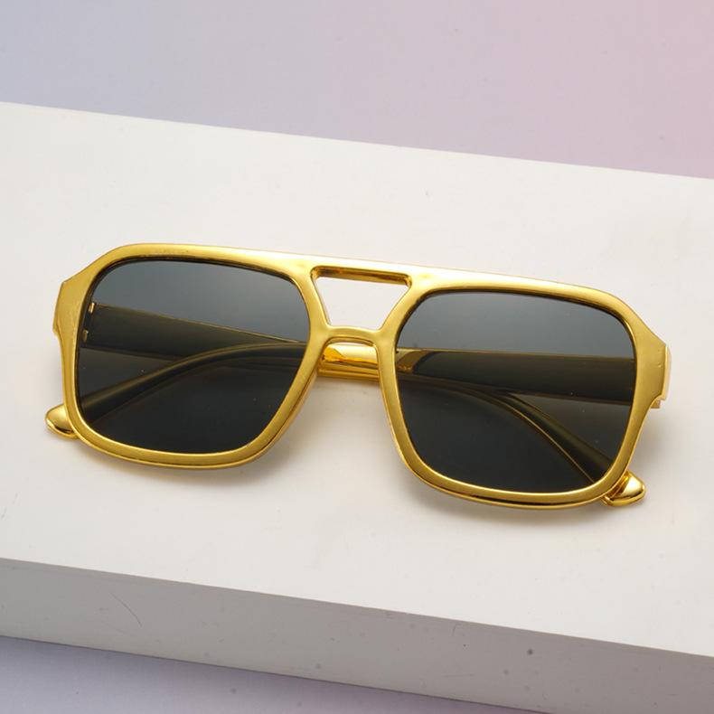 New European and American style gold large frame sunglasses, men's and women's fashion personalized sunglasses, sun protection and UV protection trend