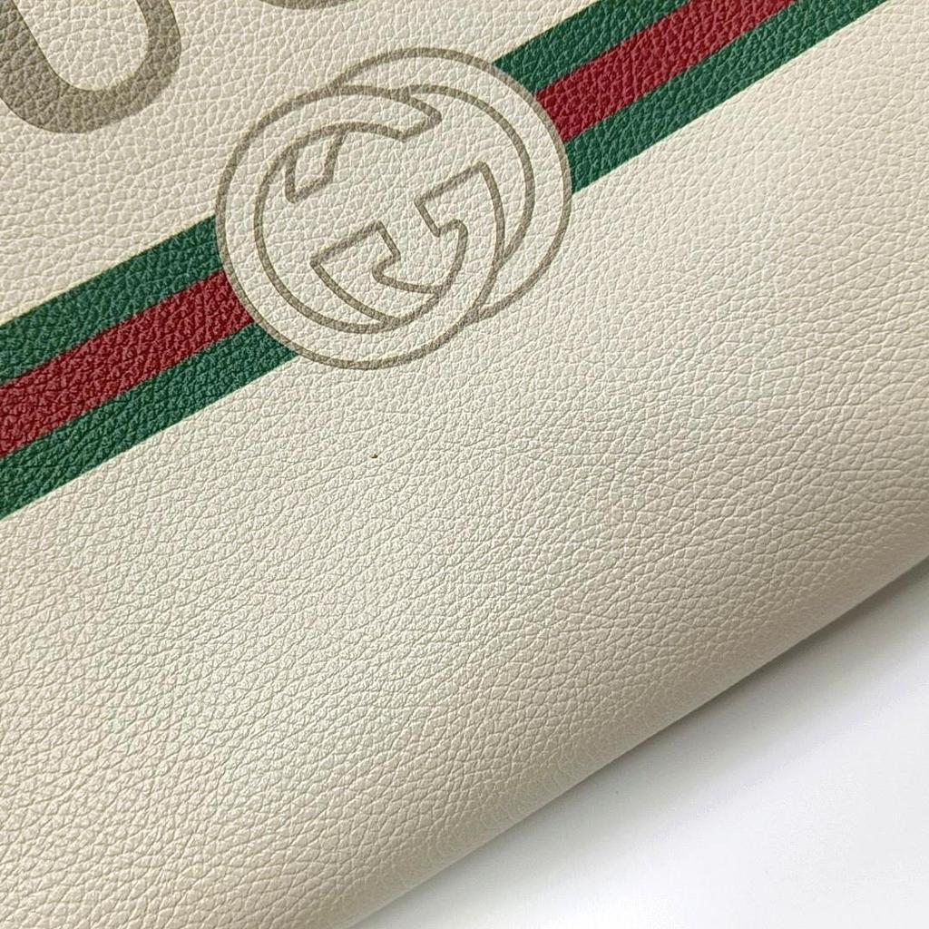 [Pre-Owned] Print Vintage Logo Wristband Leather Clutch - Very Good #B9GEJT