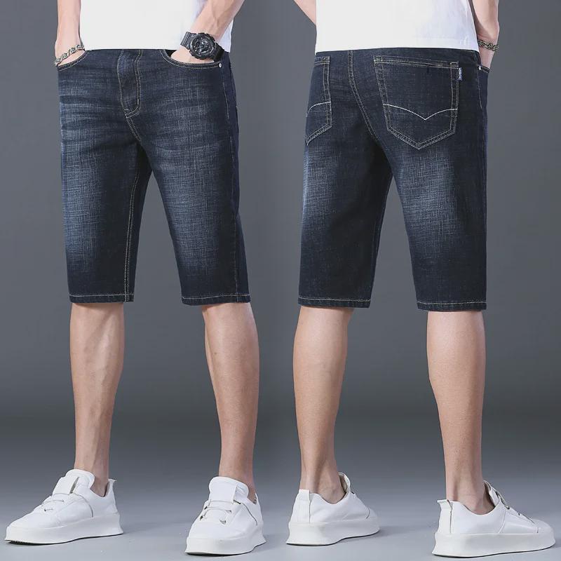 Popular Men's Cropped Four-Season Trousers: Elastic, Mid-Waist, and Trendy 7-Point Regular Denim for Youthful Style