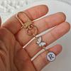 1Pc Key Logo Monogram Charm Key Fob Durability Bag Charm Lightweight Butterfly Monogram Keychain Car Key Companion Metal Keychain