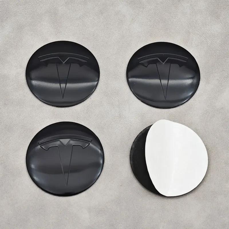 Автомобильная наклейка 2025 Новая Tesla 4 шт. 56 мм Колпачок Tesla Центральный колпачок ступицы Логотип Высококачественная наклейка для Tesla Model 3 Y S X Персонализированный автомобиль