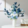 geometric small white vase with white blue bouquet