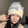 Вязаная шерстяная шапка с бантом для женщин на осень и зиму, теплая и универсальная, утолщенная защита ушей, шапка, подчеркивающая маленькое лицо