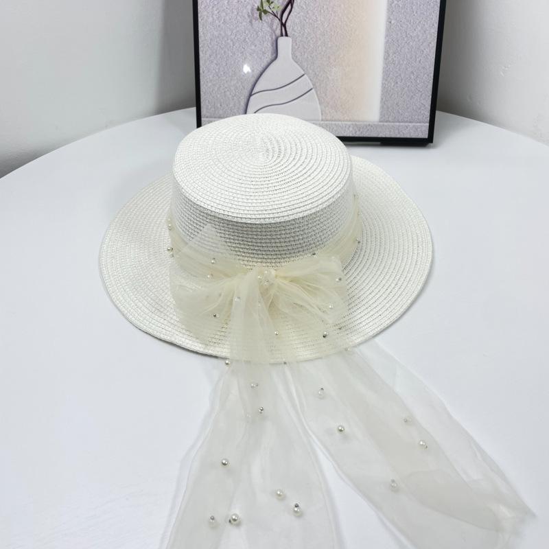 Summer elegant bow straw hat women's fashion flat top straw top hat streamer big eaves beach hat sun hat