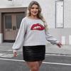 A Plus-size Women's Top with Sequined Embroidery On The Lips and A Personalized Patchwork Pullover T-shirt