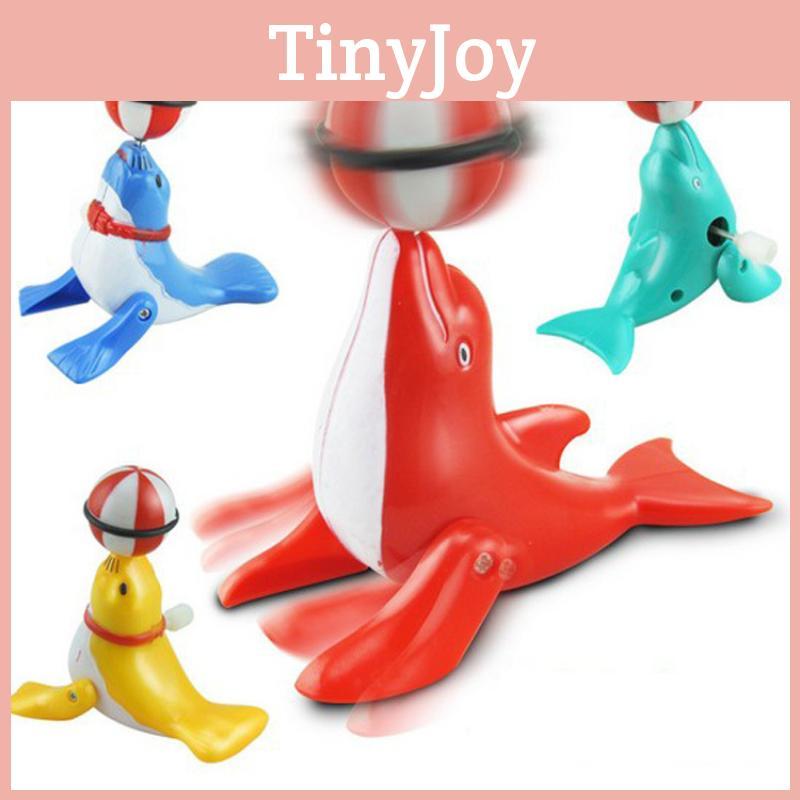 Mechanical Dolphin Rotating Toy With Chain Link Top Ball For Kids Learning And Interactive Play