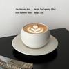 frosted white cup with ceramic plate