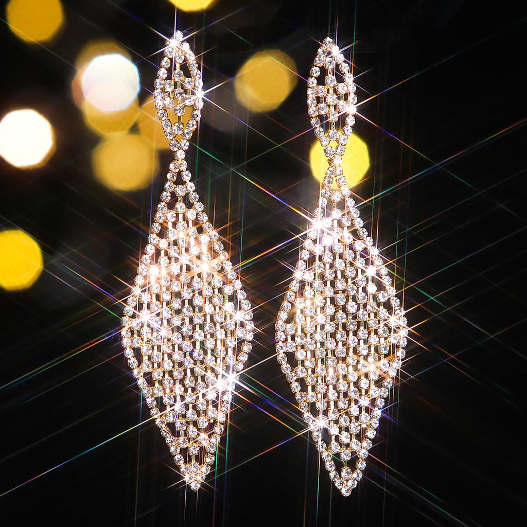 Европа и Соединенные Штаты Темперамент ветра Роскошные геометрические ромбы Длинные серьги Личность Преувеличенные блестящие элегантные бриллиантовые гвоздики