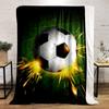 A soccer ball hitting a green net with bright orange sparks. for all seasons blanket lunch break throw gift