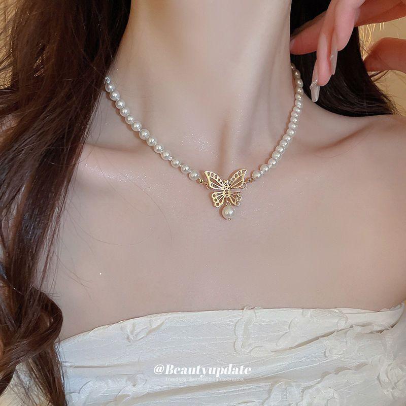 Korean temperament love butterfly pearl fringed necklace fashion collarbone chain versatile item decoration