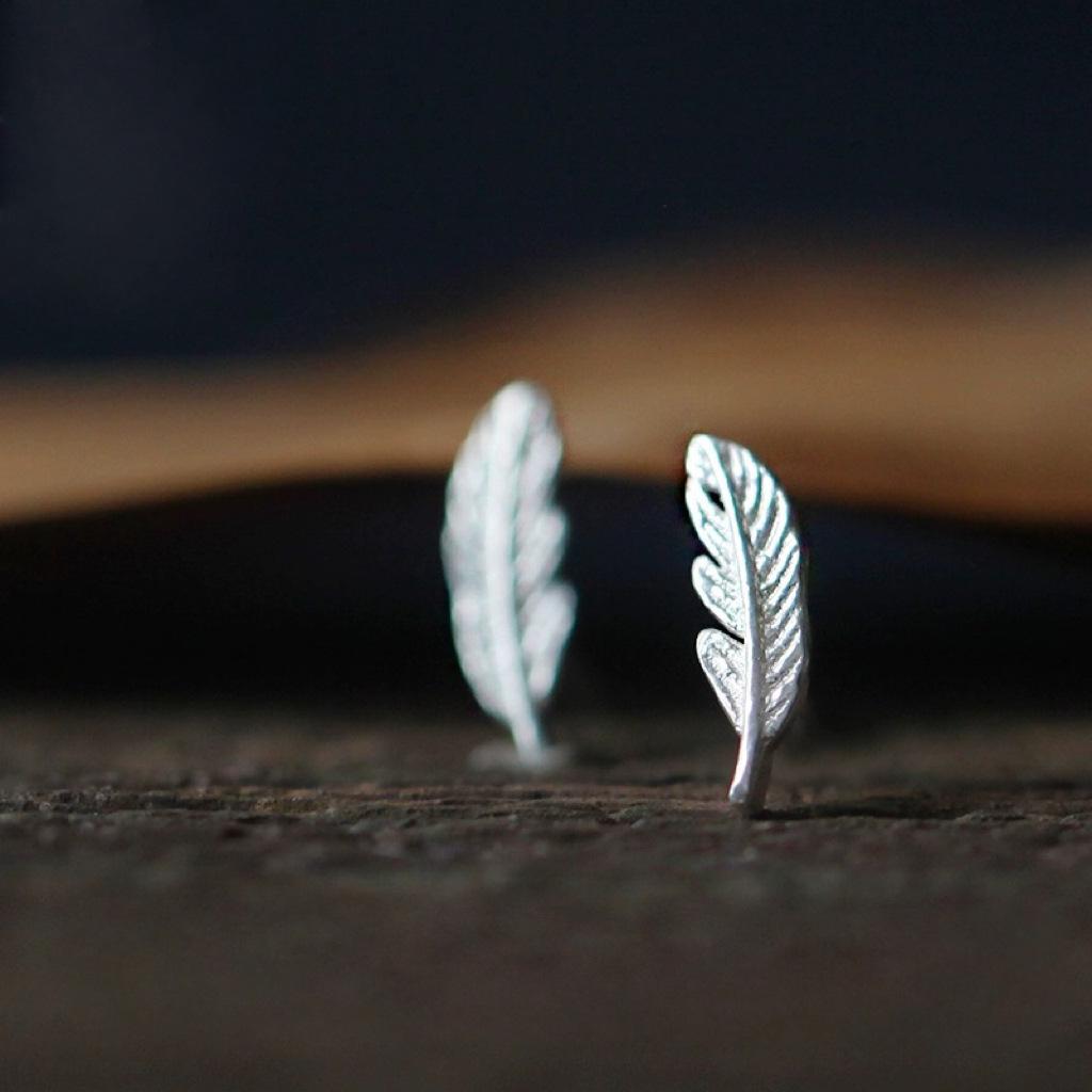 "Men's Feather Earrings: Stylish, Unique, and Trendy"