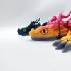 3D-печатная шарнирная фигурка трицератопса и дракона - Идеальный подарок на День защиты детей