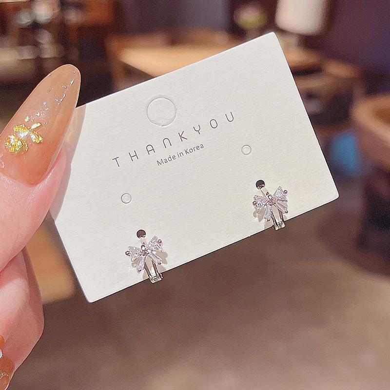 Клипсы-бантики из серебра 925 пробы с цирконием: Модные минималистичные серьги