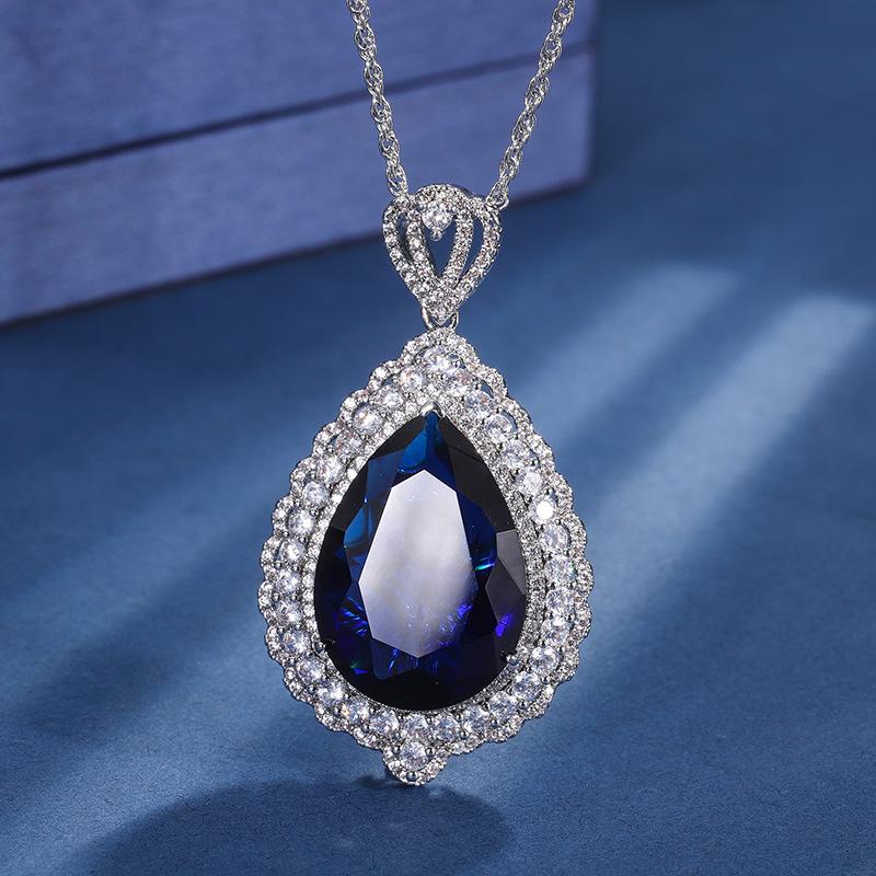 Ювелирные изделия Медное основание с золотым покрытием Имитация цвета Сокровище Большой кулон в виде капли воды Роскошная инкрустация Главный камень 18 * 25