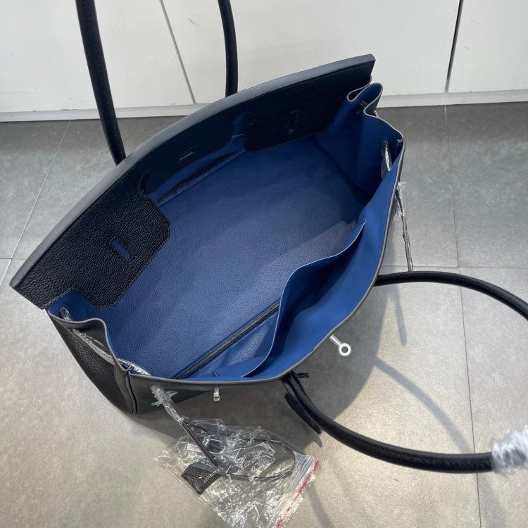 Cross-border trend bag short version oversized portable shoulder bag TOGO first layer cowhide large capacity giant pack