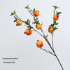 New Year Floral Arrangement with Golden Eucalyptus, Fan Leaf, Simulated Holly, Ginkgo, and Golden Leaf.