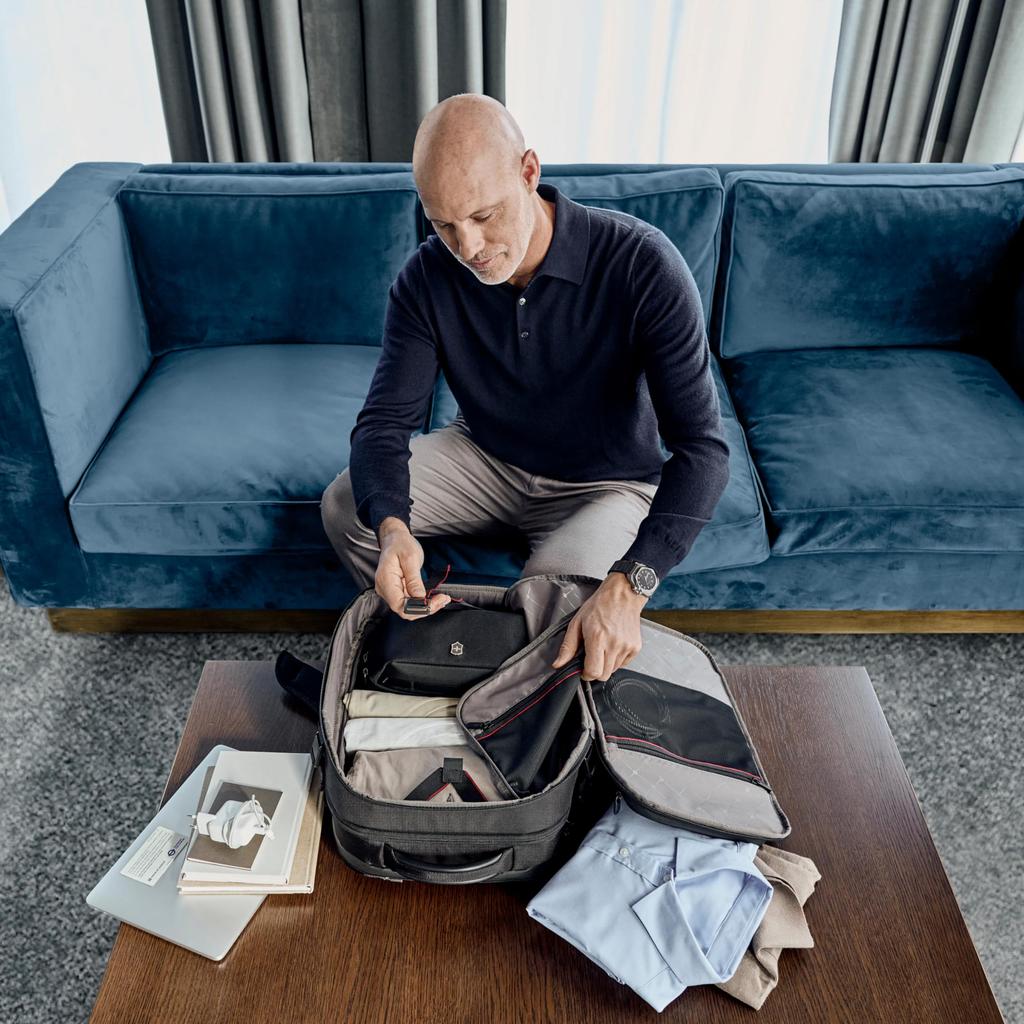 Victorinox Werks Traveler Boarding Bag Backpack with Pockets for a Laptop and an Antibacterial Compression Perfect for Business and Navy Blue 7.0