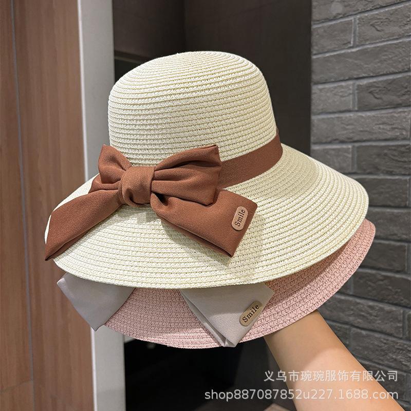 Summer papyrus woven bow big brim straw hat women's outdoor breathable seaside sunshade sunscreen elegant temperament top hat