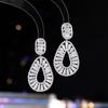 Женские серьги с элегантным дизайном в стиле легкой роскоши, инкрустированные цирконом в форме капли воды, модные и универсальные, нишевый дизайн, полые серьги
