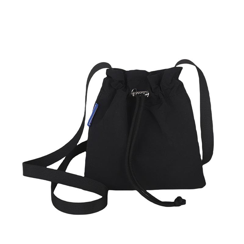 Spring and summer Korean ins style casual and light drawstring mobile phone bag niche versatile sports travel messenger nylon bag