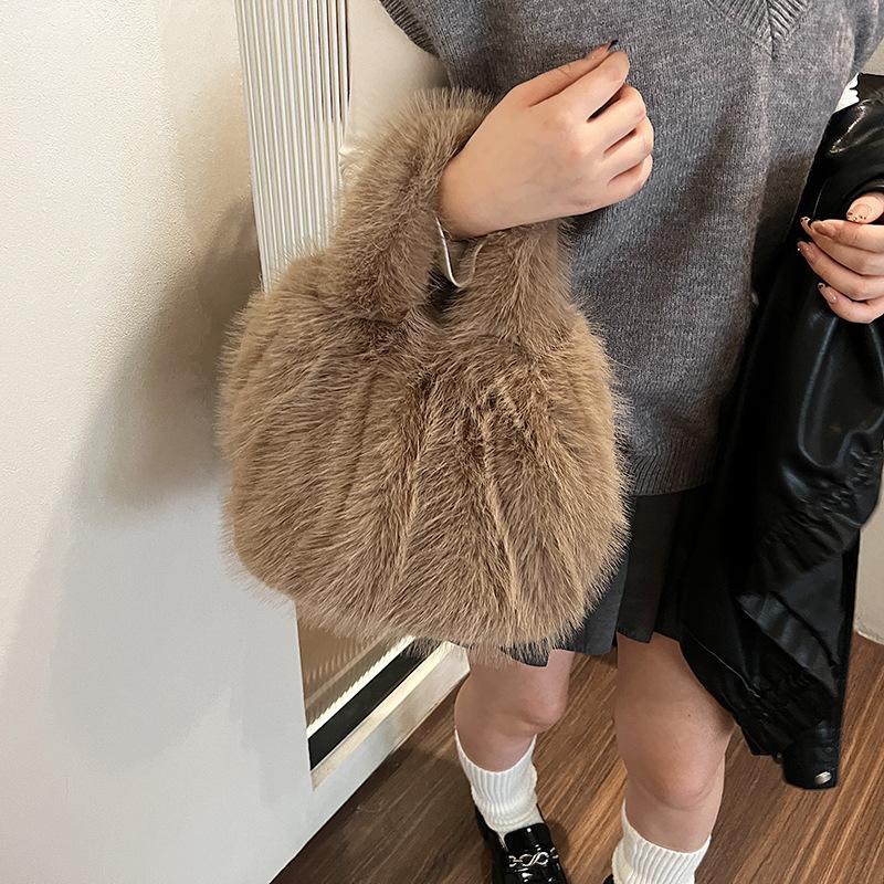 2025 new hair bag women's imitation fox hair pleated soft hand bag large capacity handbag plush bag