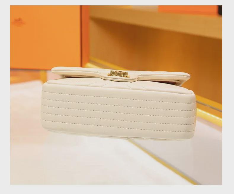 Женская сумка через плечо из натуральной кожи с замком-четырехлистником и цепочкой с бриллиантами